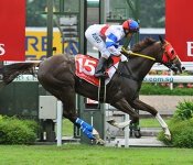 Better Life and Alan Munro take out the 2013 Emirates Singapore Derby.<br>Photo by Singapore Turf Club